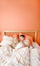 Young Couple Sleeping in Bed Royalty Free Stock Photo