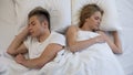 Young couple sleeping peacefully on comfortable orthopedic mattress, relax dream Royalty Free Stock Photo