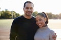 Young couple smiling at camera in Brooklyn, close up Royalty Free Stock Photo