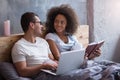 Young couple smiling to each other in bed Royalty Free Stock Photo