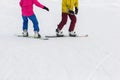 Young couple snowboarders slide down Royalty Free Stock Photo