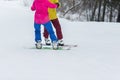 Young couple snowboarders slide down Royalty Free Stock Photo