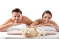Young couple with spa essentials Royalty Free Stock Photo