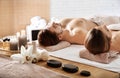 Young couple with spa essentials Royalty Free Stock Photo