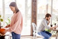 Young couple spending morning in new home, discussing their plans for future Royalty Free Stock Photo