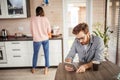 Young couple spending morning in new home, discussing their plans for future Royalty Free Stock Photo