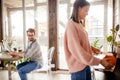 Young couple spending morning in new home, discussing their plans for future Royalty Free Stock Photo