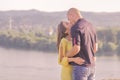 Young couple standing high kissing