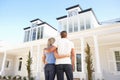 Young Couple Standing Outside Dream Home Royalty Free Stock Photo