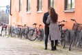 Young couple standing on a quiet urban street Royalty Free Stock Photo