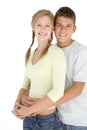 Young couple standing together smiling Royalty Free Stock Photo