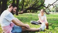 Young couple stretching at the park Royalty Free Stock Photo