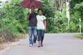 Young couple stroll in the countryside