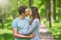 Young couple strolling in the park