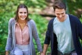 Young couple strolling in the park