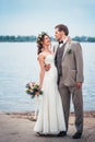 Young couple in the style of provence on background of river