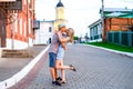 Young couple summer day in the city kiss with love concept family event, the relationship. Lifestyle in the hap Royalty Free Stock Photo