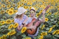 Young couple in sunflower field