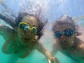 Couple having fun underwater in the sea Royalty Free Stock Photo