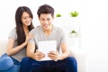 Young Couple with tablet computer Royalty Free Stock Photo