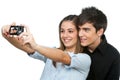 Young couple taking auto portrait with camera. Royalty Free Stock Photo