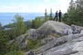 Young couple taking photo of National park Koli, Finland