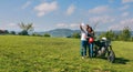 Couple taking a selfie with a motorcycle Royalty Free Stock Photo