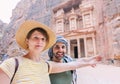 Young Couple taking selfie photo in front of the treasury of petra, jordan Royalty Free Stock Photo