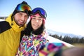 Young couple taking selfie at ski resort Royalty Free Stock Photo