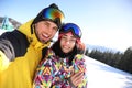 Young couple taking selfie at ski resort Royalty Free Stock Photo