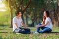 Young couple talking and laghing in park Royalty Free Stock Photo
