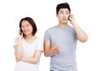 Young couple talking on mobile phone Royalty Free Stock Photo