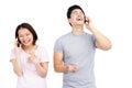 Young couple talking on mobile phone Royalty Free Stock Photo