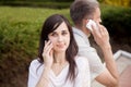 Young couple talking on phone Royalty Free Stock Photo