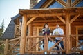 Young couple on terrace looking at distance