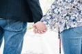 Young couple with their hands interlaced