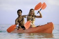 Young couple with their kayak