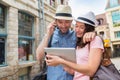 Young couple of tourists booking hostel