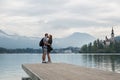 Young couple of tourists in love on the Lake Bled, Slovenia. Royalty Free Stock Photo