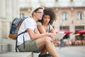 Young couple tourists visiting bordeaux and checking map Royalty Free Stock Photo