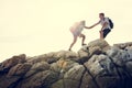 Young couple traveling together on hill