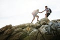 Young couple traveling together over the hill Royalty Free Stock Photo