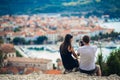 Young couple travelling and visiting Europe.Summer touring Europe and Mediterranean culture.Colourful streets,cityscape Royalty Free Stock Photo