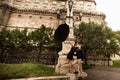 Young couple with umbrella walking in Budapest on a rainy day. Love story Royalty Free Stock Photo