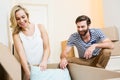 Young couple unpacking carton in their new house Royalty Free Stock Photo