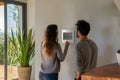 young couple use smart home Royalty Free Stock Photo