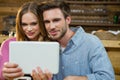 Young couple using digital tablet Royalty Free Stock Photo