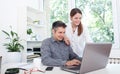 Young couple using laptop