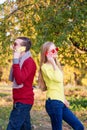 Young couple using a mobile phones. Young couple talking themselves by mobile phone. Royalty Free Stock Photo