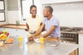 Young couple using tablet at breakfast Royalty Free Stock Photo